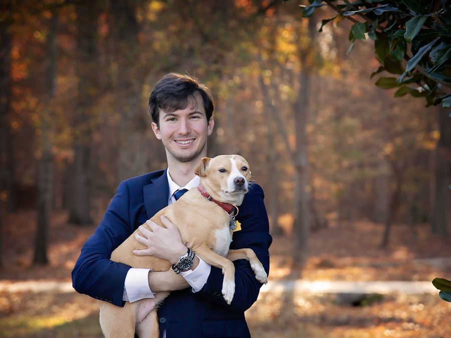 Holding my dog outdoors in autumn