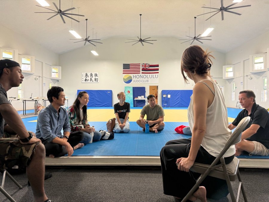 A Honolulu Japanese Language Exchange meetup, sitting in a circle on the mats at Honolulu Judo Club