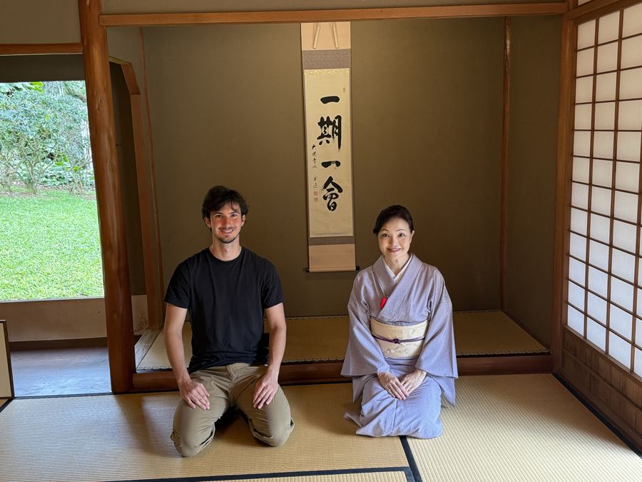 Kneeling in a tatami tea room beside my green tea ceremony instructor
